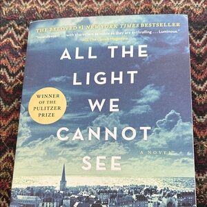All the Light We Cannot See — Blue Paperback Novel